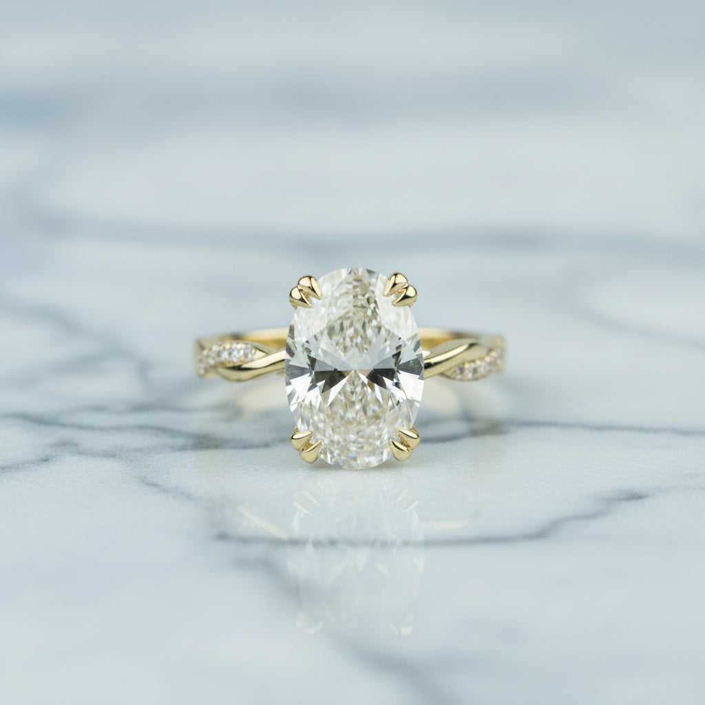 Gold ring with a large diamond on a light background