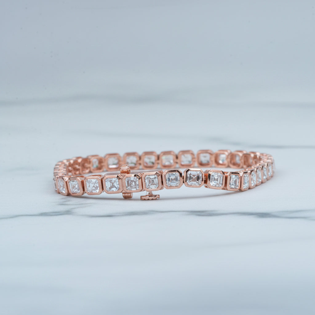 Rose gold bracelet with diamonds on a light surface with greenery in the background